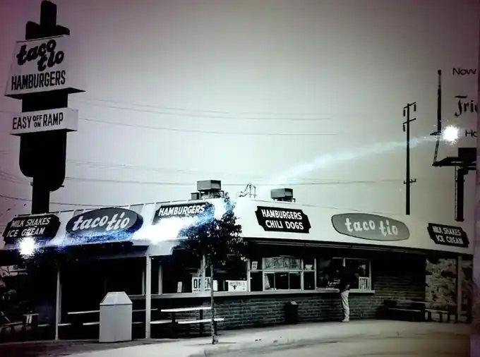 Black and white photograph of the Taco Tio drive-in
