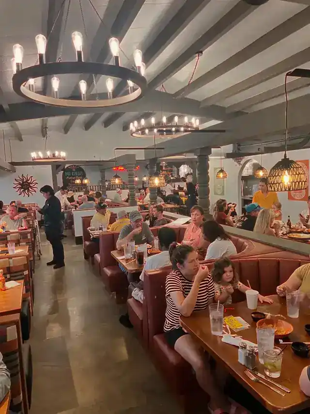 Mi Casa's remodeled dining room with new booths under the wagon wheel chandeliers